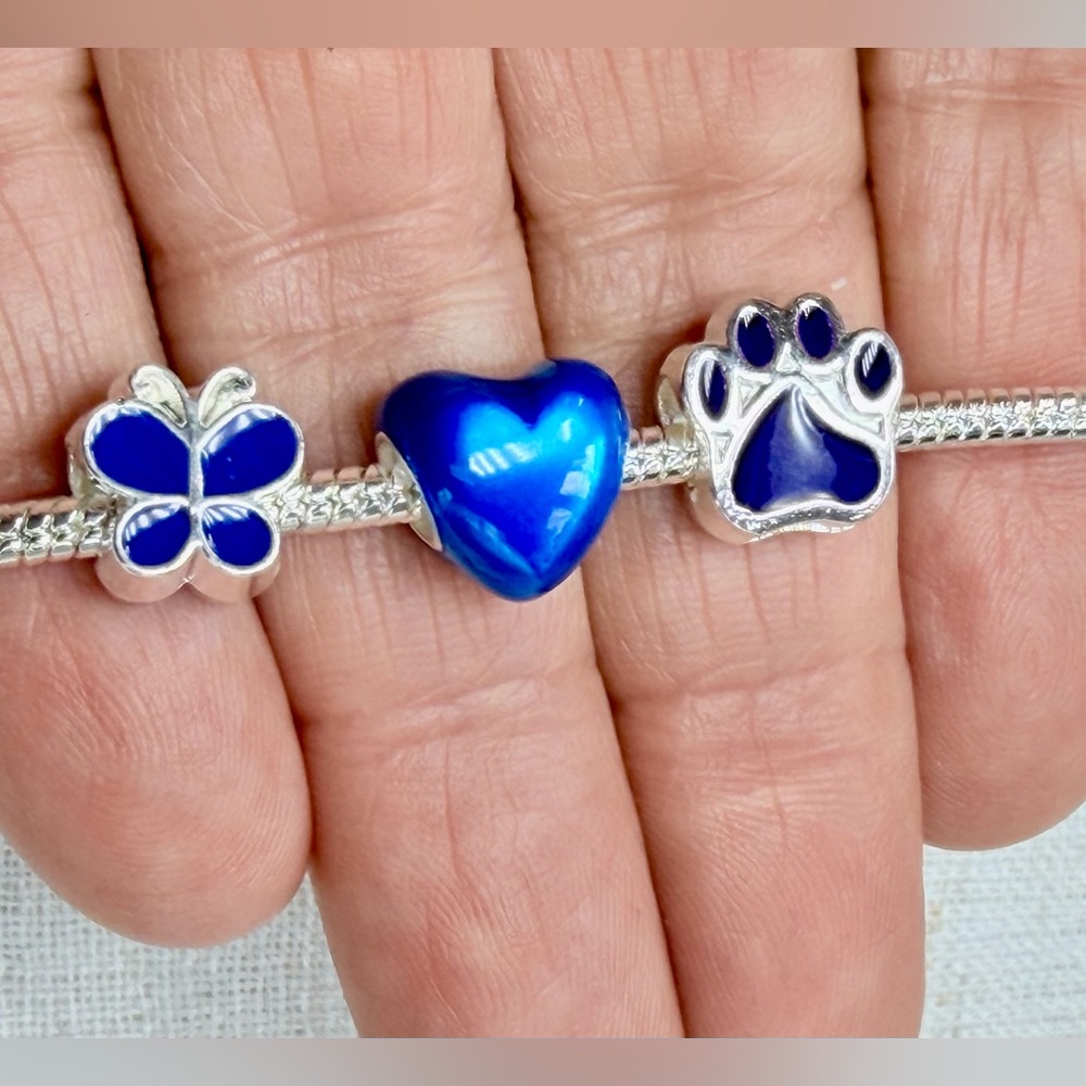 Sterling silver snake chain bracelet,blue dog pow print, butterfly,heart charm